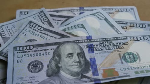 Rotating stock footage shot of $100 bills - MONEY 0142