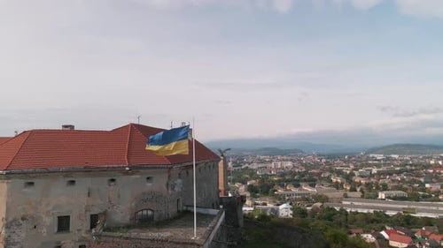 Aerial View of Historic Castle with Ukraine Flag