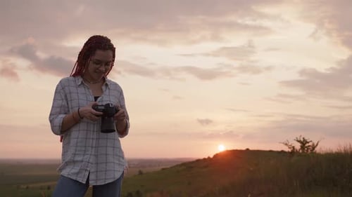 Close Up View of a Young Girls That Looks on Her Camera