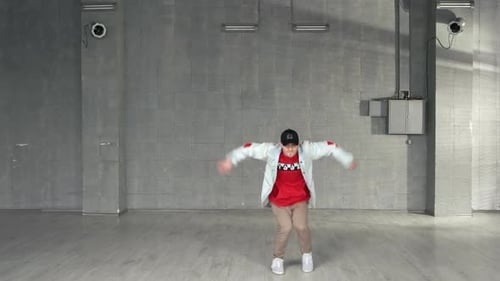 Young Stylish Man Is Dancing.