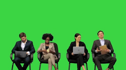 Office Workers Colleagues at the Business Meeting on a Green Screen Chroma Key