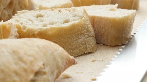 French baguette on the table close-up tilt 4K 2160p UltraHD footage - Fresh traditional in France