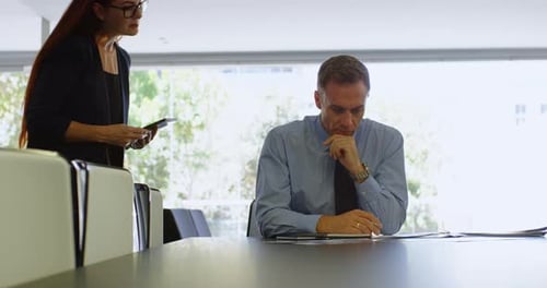 Colleagues Meeting in Bright Modern Office