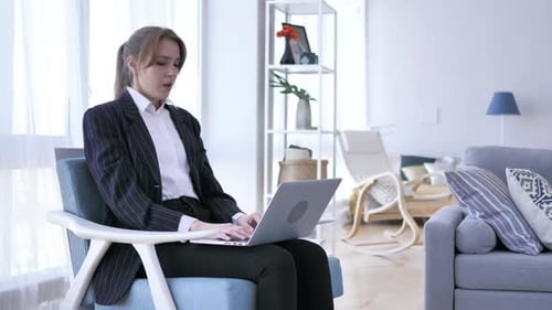Sick Creative Woman Coughing at Work in Office Cough