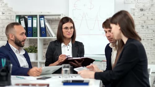Business Team Meeting in Modern Workplace Office