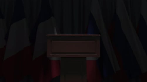 Flags of Russia and France and Tribune