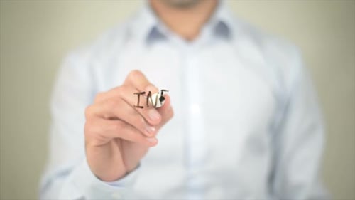 Man Writing Information Security on Glass Surface