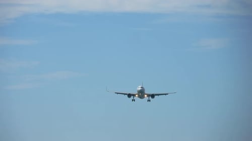 Passenger Plane Flies to Land