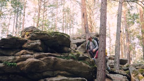 Excited Tourists Are Walking Up Mountain Helping Each Other Then Standing on Top and Enjoying View