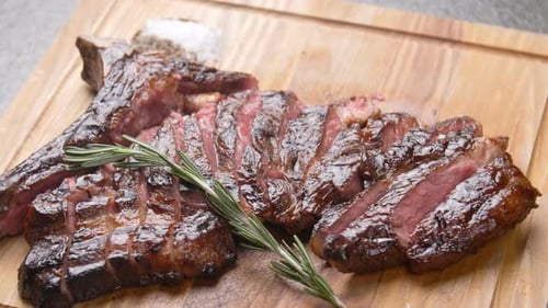 Juicy Grilled Steak Close Up on Cutting Board