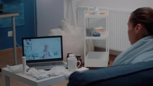 Woman Attends Telehealth Appointment at Home