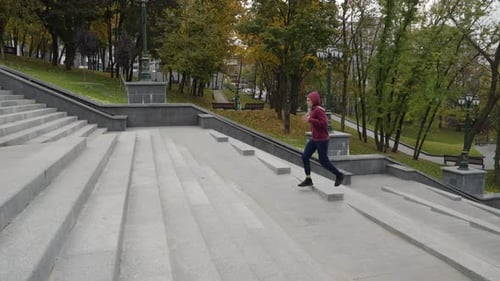 Slow Motion Man Running on Stairs
