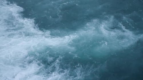 Powerful Rushing Ocean Water Surface with White Foam