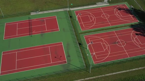View From the Height of the Empty Tennis Courts in the Daytime in Summer