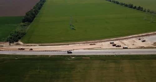 Road Construction Site with Machinery, Bulldozer, Excavation From Above. Video, Aerial View