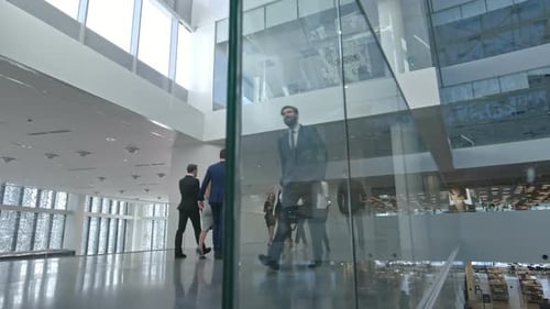 Businesspeople Walking in Business center