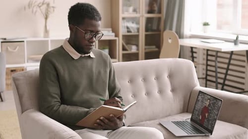 Student Attends Online Lecture at Home