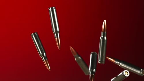 Bullets falling bouncing in ultra slow motion 1500fps on a reflective surface - BULLETS PHANTOM