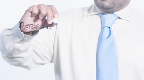 Asian Businessman Writes Preferences