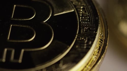 Close Up of Shiny Gold Bitcoin Coins