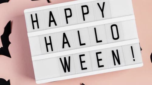 Festive "Happy Halloween!" Sign with Decorations