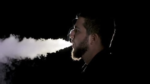 Man Vaping Electronic Cigarette, Silhouette Profile