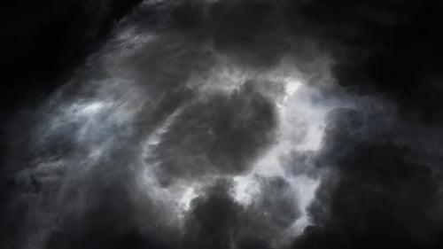 Dark Storm Clouds Swirling in the Night Sky