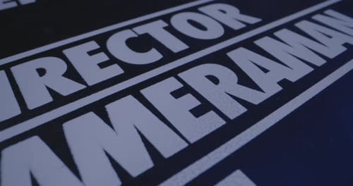 Close Up of a Black Clapperboard on Set