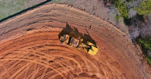 Large Wheel Loader Aligns a Piece of Land for a New Building