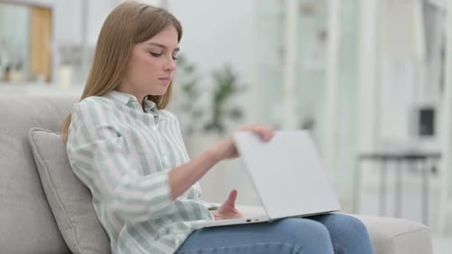 Hardworking Young Woman Closing Laptop and Going Away