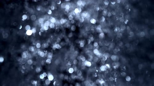 Defocused Silver Bokeh Texture Loop