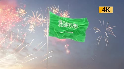 Waving Saudi Arabia Flag with Festive Fireworks Display