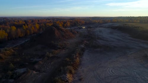 Aerial View of Sand Dunes with Abandoned Excavator