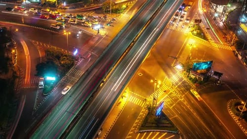 Time Lapse of Busy Highway Road Junction in Metropolis City Center at Night