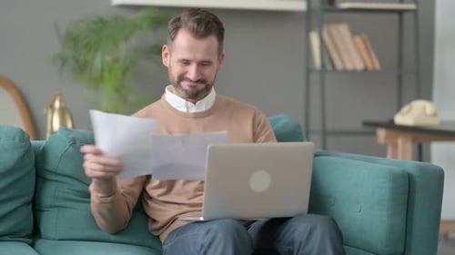 Excited Young Adult Celebrating Good News