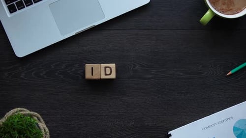 Wooden Blocks Spelling Ideas on Office Workspace Desk