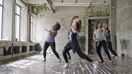 Energetic Women Dance in Fitness Class Studio