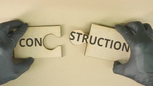 Completing Jigsaw Puzzle with CONSTRUCTION Text