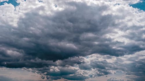 Timelapse of Gray Cumulus Clouds Moves in Blue Dramatic Sky Cirrus Cloud Space