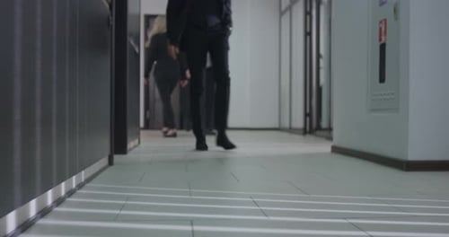 Business People Walking in Modern Office Building