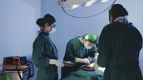 Surgeons Performing Operation in Modern Operating Room
