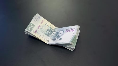Stack of Mexican One Thousand Peso Bills