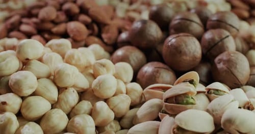 Bunches of Assorted Healthy Nuts Almonds Pistachios Cashews and Hazelnuts