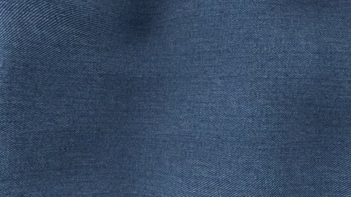 Waving Blue Denim Fabric Seamless Loop Motion Background