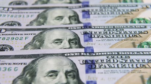 Macro Shot of Repeating One Hundred Dollar Bills