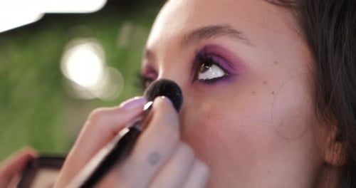 Woman Receives Make Up Application Close Up