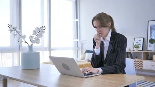 Young Woman Coughing at Work in Office, Cough