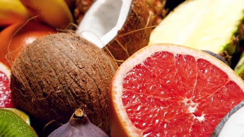 Bright Tropical Fruits Rotating Close-Up Display