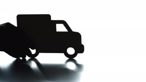 Cardboard Truck Delivery Silhouette with Reflection