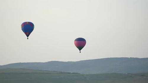 Beautiful Rocky Landscape of Crimea with Colorful Hotair Balloons Balloons Flying on Sunset HDR Time